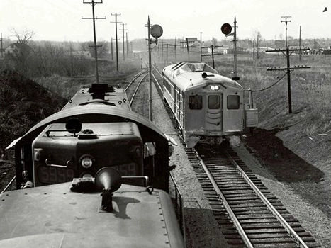 NYC trains pass near Oxford MI